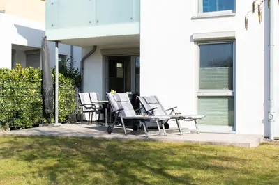 Ein Garten an der Unterkunft Ferienwohnung Dünenhäuser App. A2