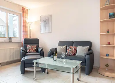Ein Sitzbereich in der Unterkunft Ferienwohnung Dorfmeyer