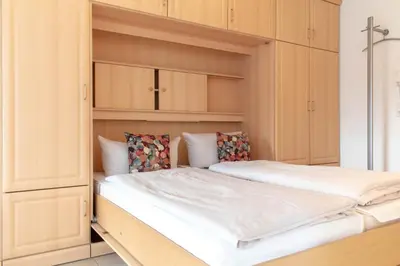 Ein Bett oder Betten in einem Zimmer der Unterkunft Ferienwohnung Dorfmeyer