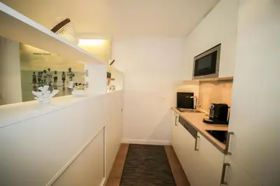 Küche/Küchenzeile in der Unterkunft Ferienwohnung Am Strand