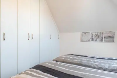 Ein Bett oder Betten in einem Zimmer der Unterkunft Ferienwohnung Ausblick
