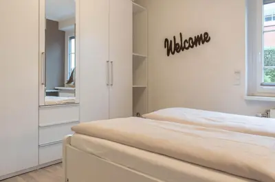 Ein Bett oder Betten in einem Zimmer der Unterkunft Ferienwohnung Ausspann