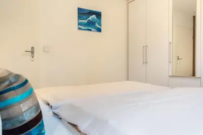 Ein Bett oder Betten in einem Zimmer der Unterkunft Ferienwohnung Ausspann