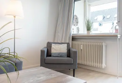 Ein Sitzbereich in der Unterkunft Ferienwohnung Meerkieker