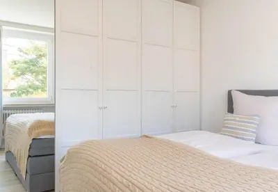 Ein Bett oder Betten in einem Zimmer der Unterkunft Ferienwohnung Meerkieker
