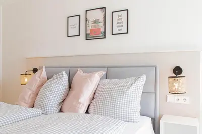 Ein Bett oder Betten in einem Zimmer der Unterkunft Ferienwohnung Seesand No.08