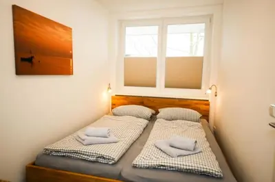 Ein Bett oder Betten in einem Zimmer der Unterkunft Ferienwohnung Seesternchen 1
