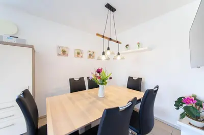 Ein Sitzbereich in der Unterkunft Ferienwohnung Lotsenwache