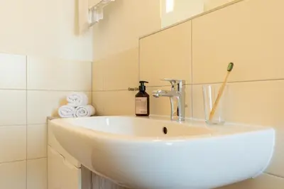 Ein Badezimmer in der Unterkunft Ferienwohnung Lotsenwache