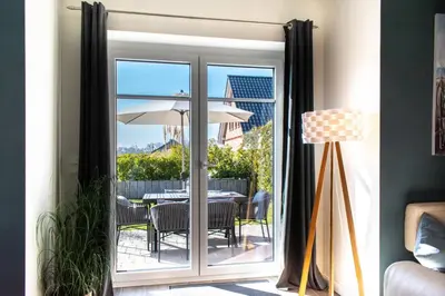 Ein Sitzbereich in der Unterkunft Ferienhaus Carpe Diem