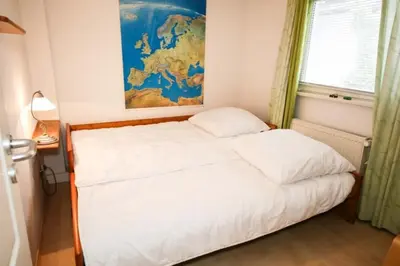 Ein Bett oder Betten in einem Zimmer der Unterkunft Ferienhaus Fischerhus Hans