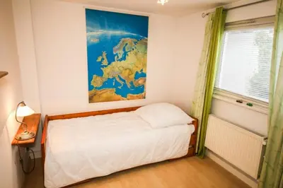 Ein Bett oder Betten in einem Zimmer der Unterkunft Ferienhaus Fischerhus Hans
