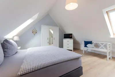 Ein Bett oder Betten in einem Zimmer der Unterkunft Ferienhaus Isabel
