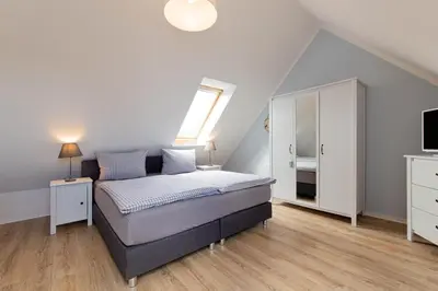 Ein Bett oder Betten in einem Zimmer der Unterkunft Ferienhaus Isabel