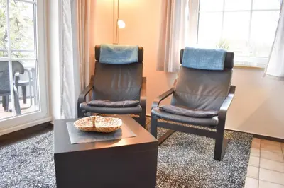 Ein Sitzbereich in der Unterkunft Ferienwohnung Am Kurpark