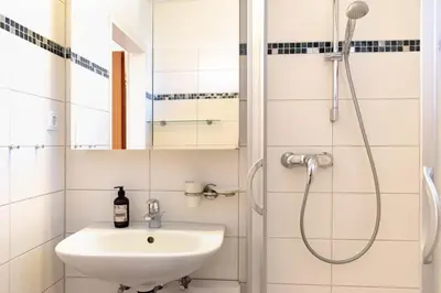 Ein Badezimmer in der Unterkunft Ferienwohnung Am Kurpark
