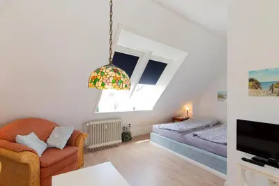 TV/Unterhaltungsangebot in der Unterkunft Ferienwohnung App.11 Haus Duckdalben