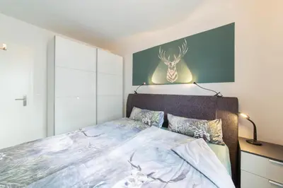 Ein Bett oder Betten in einem Zimmer der Unterkunft Ferienwohnung Auszeit