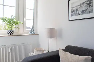Ein Sitzbereich in der Unterkunft Ferienwohnung Der Olle Hansen