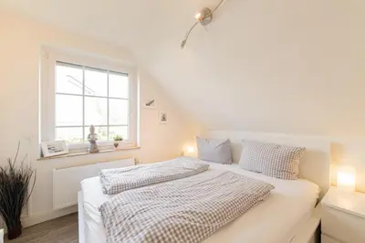 Ein Bett oder Betten in einem Zimmer der Unterkunft Ferienwohnung Lieblingsplatz
