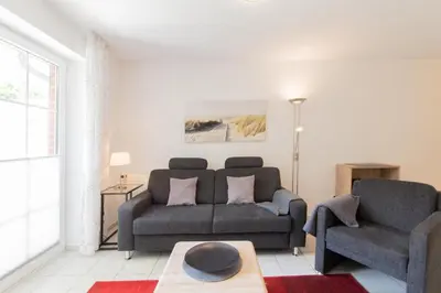 Ein Sitzbereich in der Unterkunft Ferienwohnung Gorch Fock Park Appartement 19