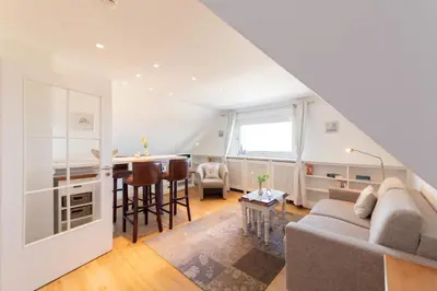Ein Sitzbereich in der Unterkunft Ferienwohnung Lachmöwe