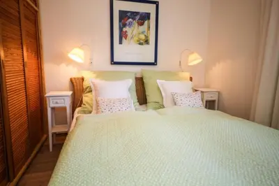 Ein Bett oder Betten in einem Zimmer der Unterkunft Ferienwohnung Kleine Freiheit
