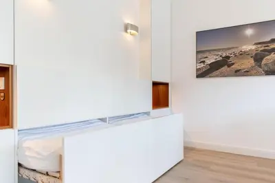 Ein Bett oder Betten in einem Zimmer der Unterkunft Ferienwohnung Kuschelmuschel