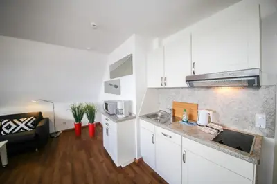 Küche/Küchenzeile in der Unterkunft Ferienwohnung Jolle Haus Duckdalben