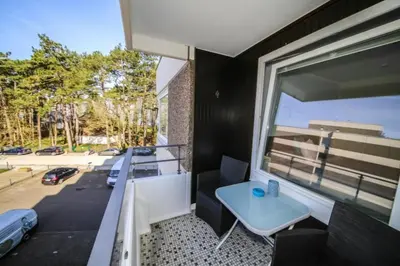 Ein Balkon oder eine Terrasse in der Unterkunft Ferienwohnung Koje 117 im Haus Carpe Diem
