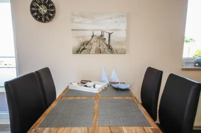 Ein Sitzbereich in der Unterkunft Ferienwohnung Küstenzauber