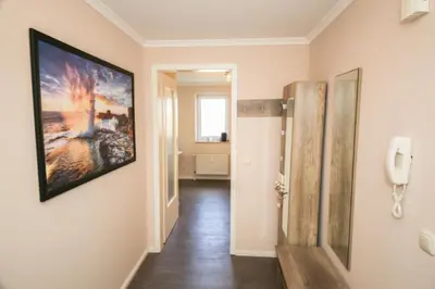 Ein Bett oder Betten in einem Zimmer der Unterkunft Ferienwohnung Küstenzauber