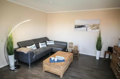 Ein Sitzbereich in der Unterkunft Ferienwohnung Küstenzauber