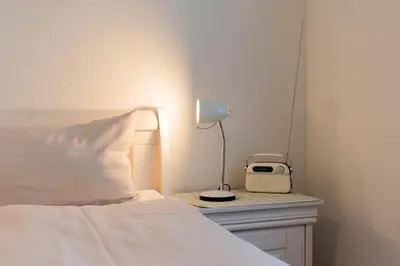 Ein Bett oder Betten in einem Zimmer der Unterkunft Ferienwohnung Kurpark-Residenz App. 5
