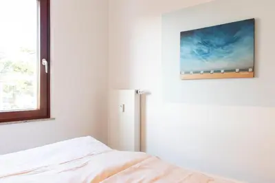 Ein Bett oder Betten in einem Zimmer der Unterkunft Ferienwohnung Kajüte