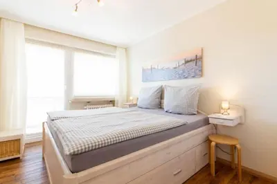 Ein Bett oder Betten in einem Zimmer der Unterkunft Ferienwohnung Haus Baltic App. 06
