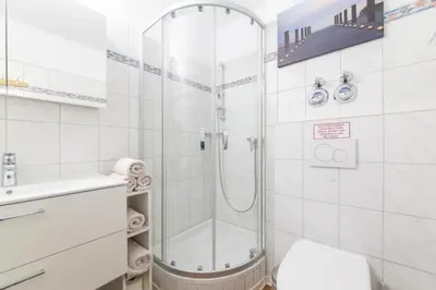 Ein Badezimmer in der Unterkunft Ferienwohnung Haus Baltic App. 06