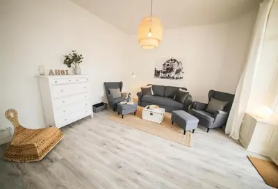 Ein Sitzbereich in der Unterkunft Ferienwohnung LUV im Haus Demory