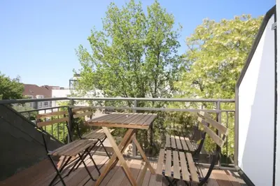 Ein Balkon oder eine Terrasse in der Unterkunft Ferienwohnung Maisonette Strandallee