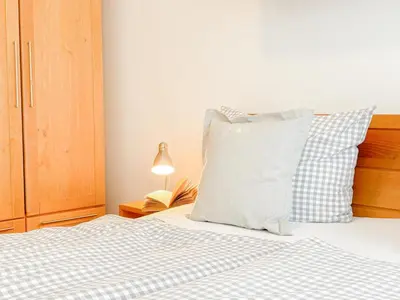 Ein Bett oder Betten in einem Zimmer der Unterkunft Ferienwohnung Strandroggen