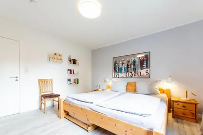 Ein Bett oder Betten in einem Zimmer der Unterkunft Ferienwohnung Havenothstrasse