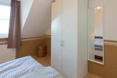 Ein Bett oder Betten in einem Zimmer der Unterkunft Ferienwohnung MehrBlick 33