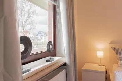 Ein Bett oder Betten in einem Zimmer der Unterkunft Ferienwohnung Muschel 1
