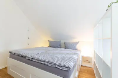 Ein Bett oder Betten in einem Zimmer der Unterkunft Ferienwohnung Ocean Lodge 2