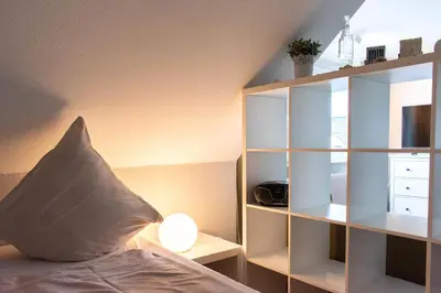Ein Bett oder Betten in einem Zimmer der Unterkunft Ferienwohnung Ocean Lodge 2