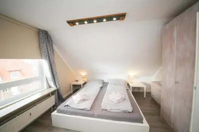 Ein Bett oder Betten in einem Zimmer der Unterkunft Ferienwohnung Ocean Pearl