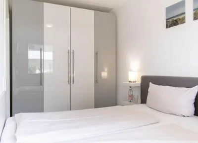 Ein Bett oder Betten in einem Zimmer der Unterkunft Ferienwohnung Ostseeperle