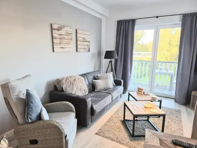 Ein Sitzbereich in der Unterkunft Ferienwohnung Pier99