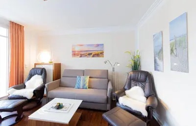Ein Sitzbereich in der Unterkunft Ferienwohnung Ostseestübchen