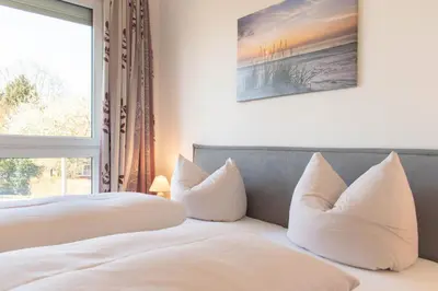 Ein Bett oder Betten in einem Zimmer der Unterkunft Ferienwohnung Möwennest